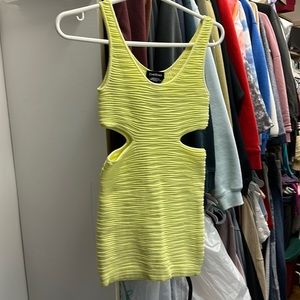 Yellow Bebe dress with side cutouts
